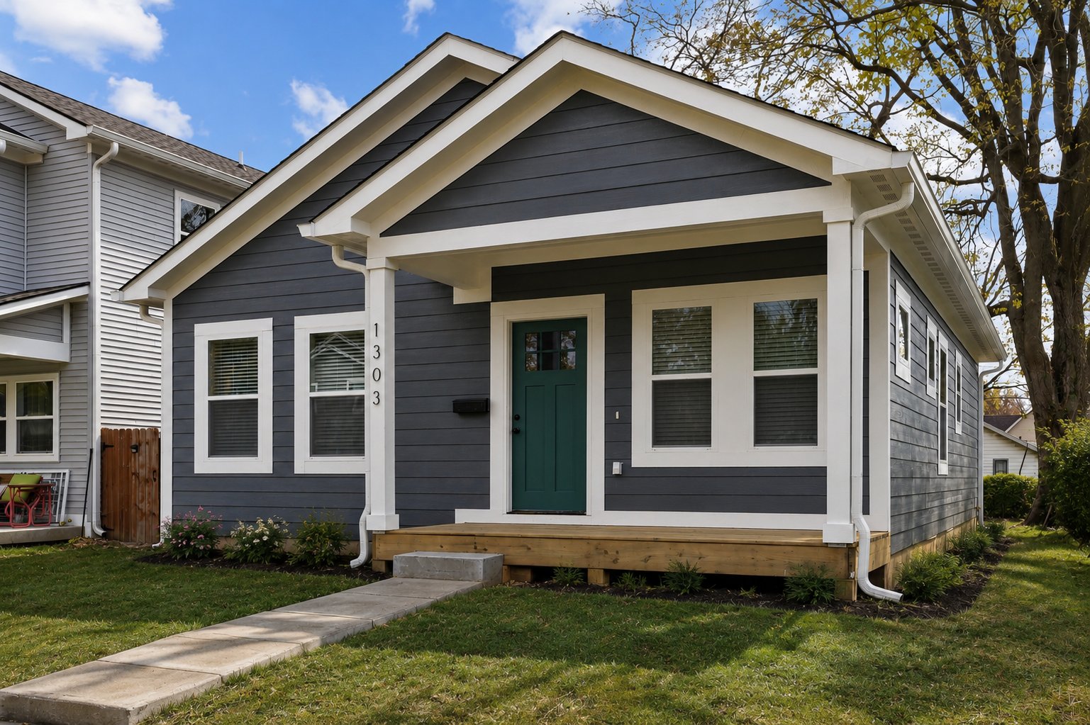 Single-story cottage with a gabled front porch
