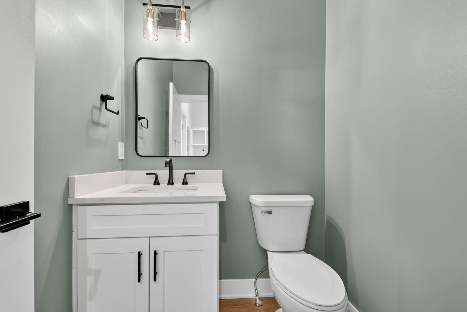 Sage green powder room