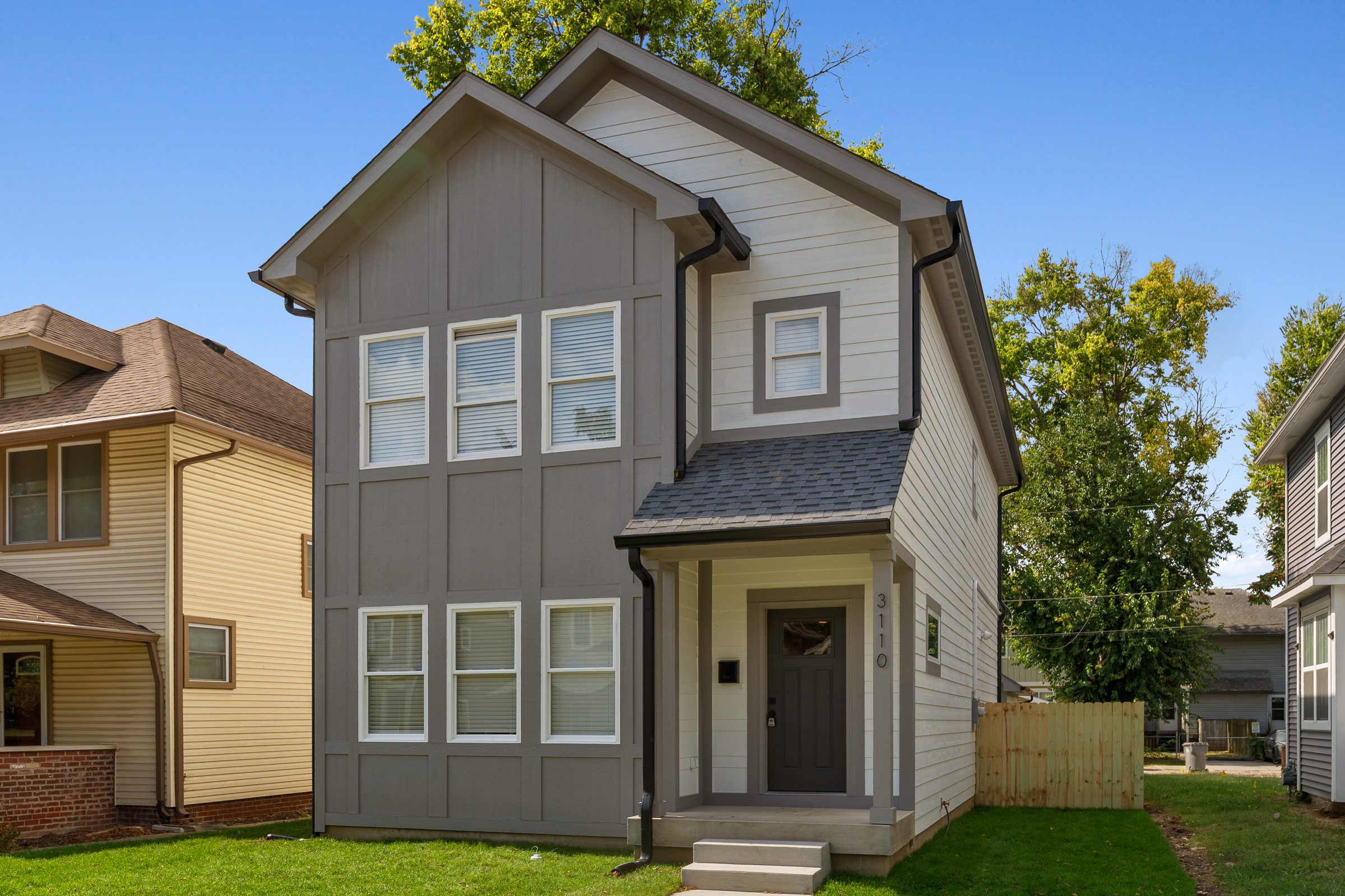 Front of the charcoal board-and-batten home
