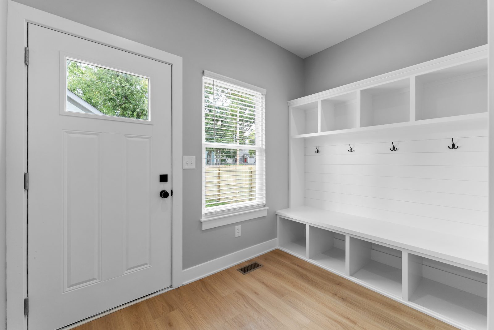 Back door drop zone with bench and cubbies