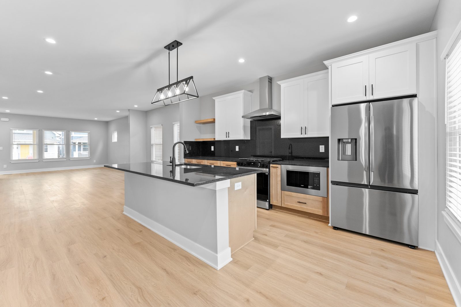 Kitchen and dining open to the front of the home