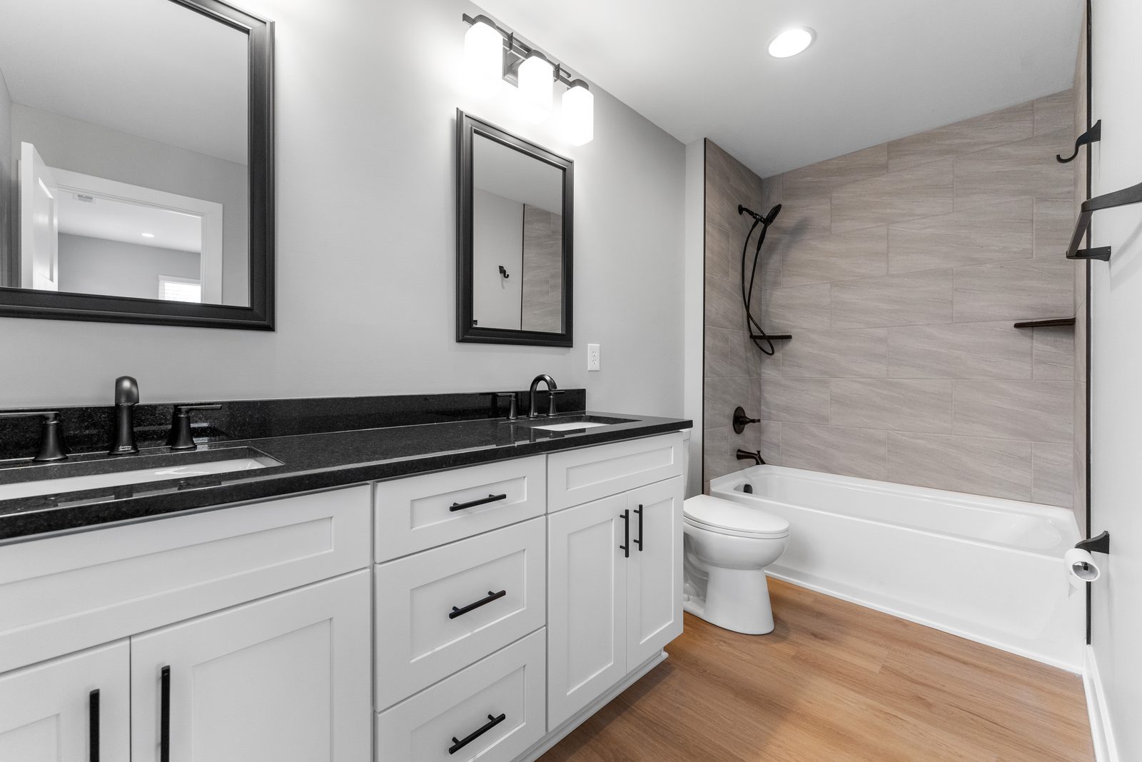 Bath with double vanity and tile surround