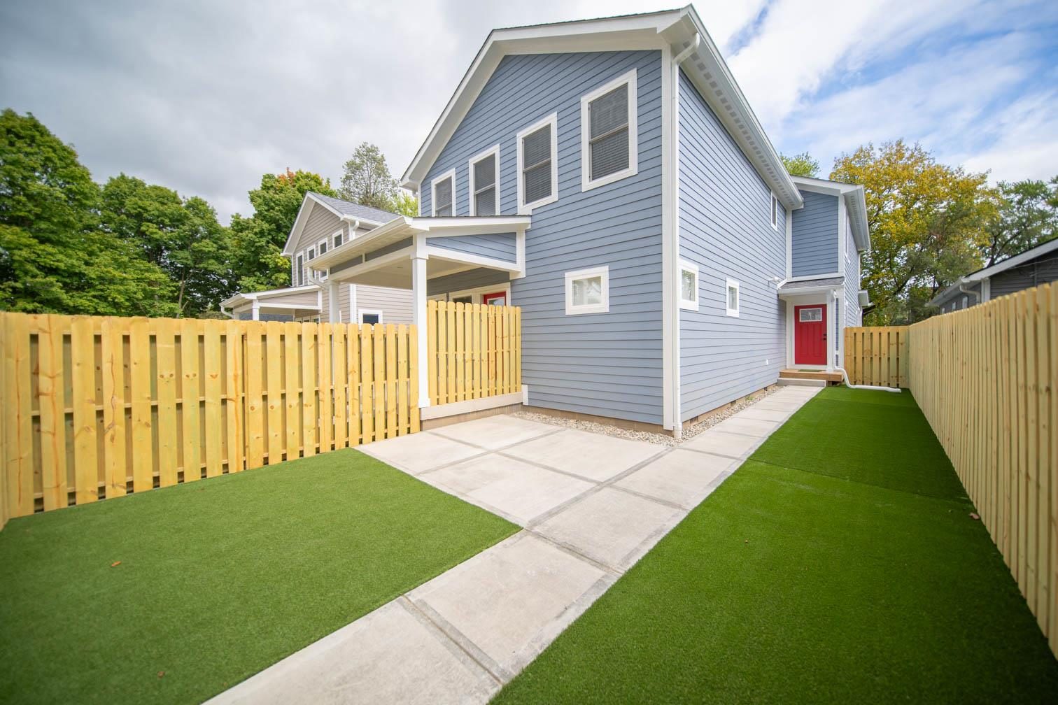 Fenced turf backyard