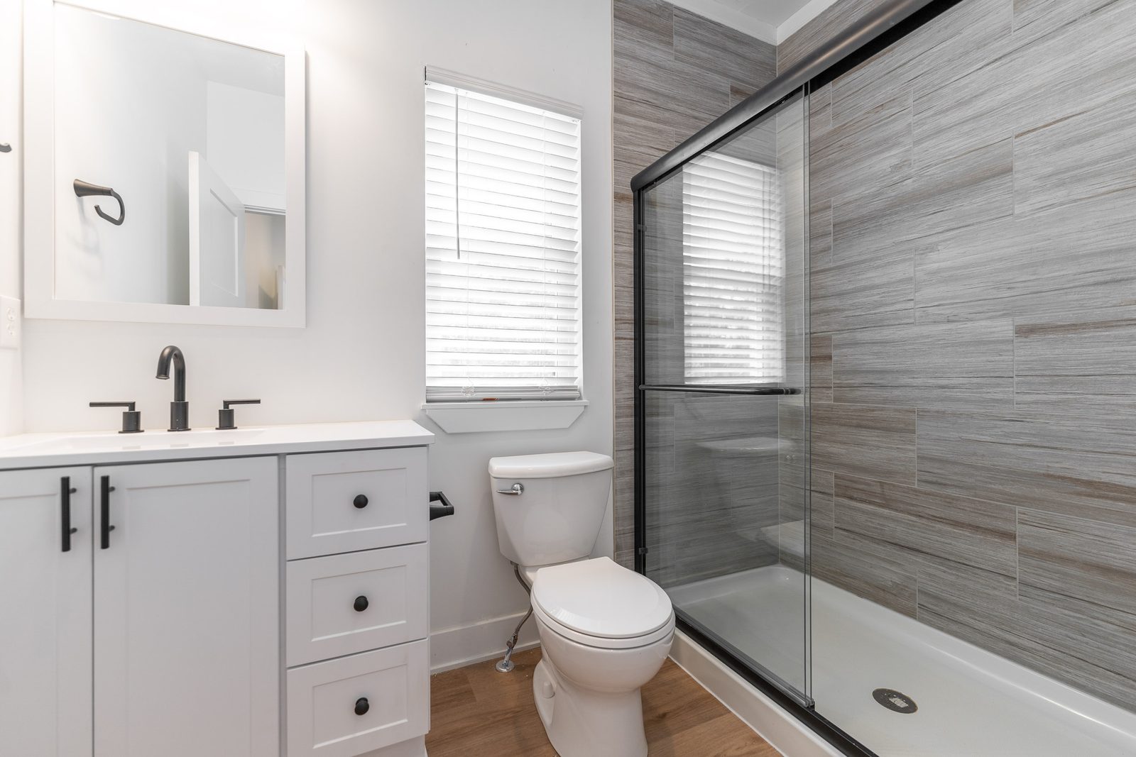 Bath with glass shower