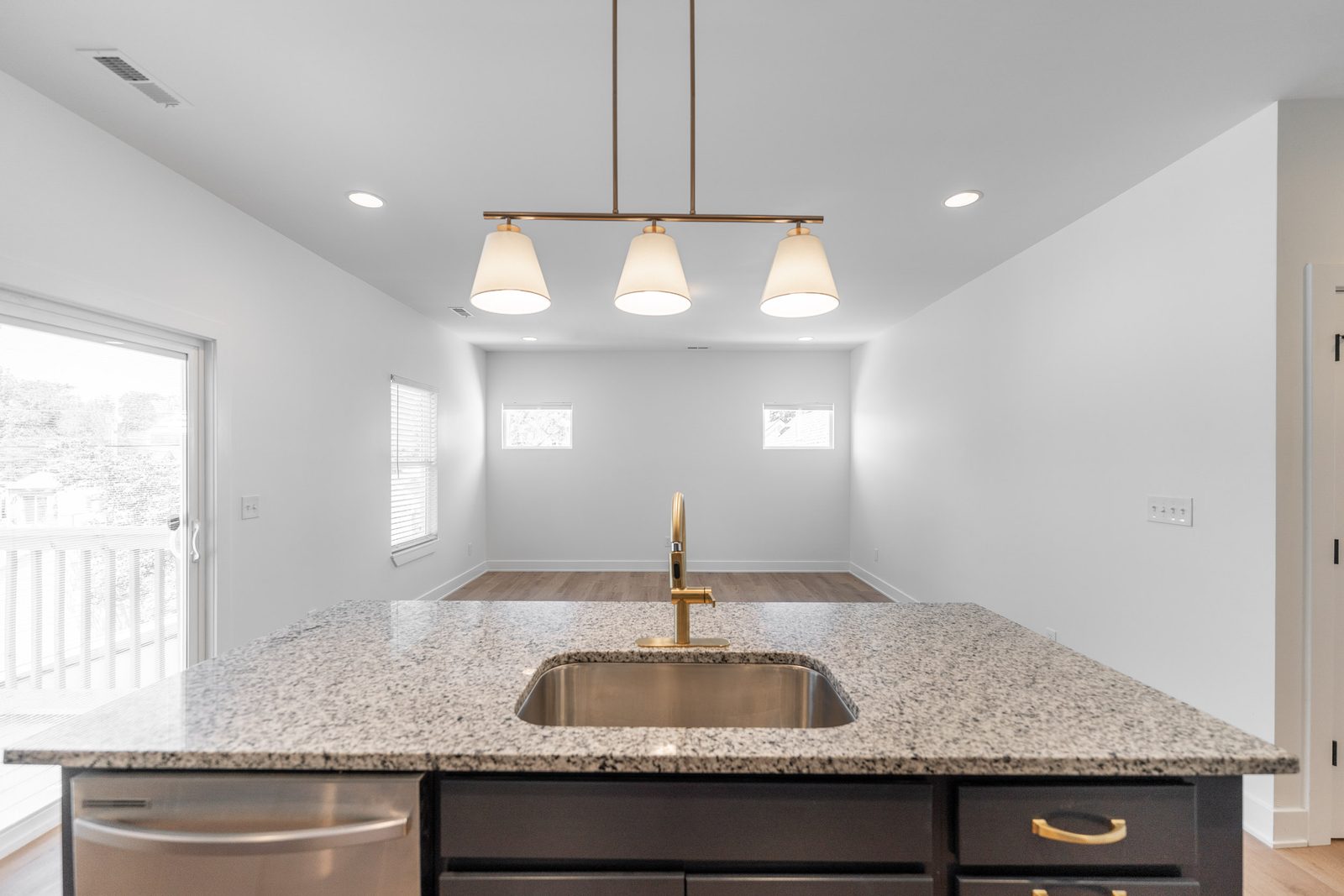 Granite island and brass faucet